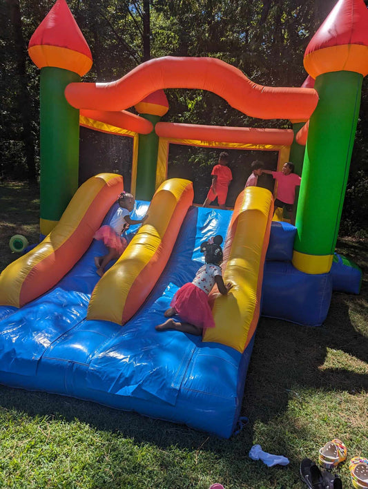 Large double slide bounce house For Rent